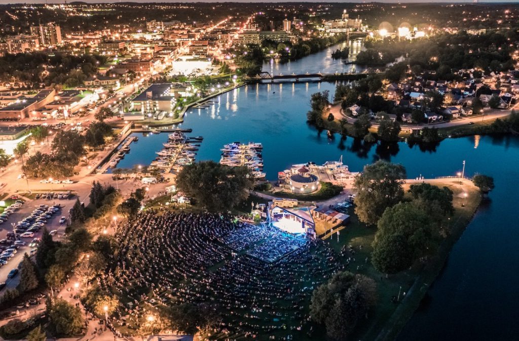 Aerial view of downtown Peterborough and the Otonabee riverfront at night