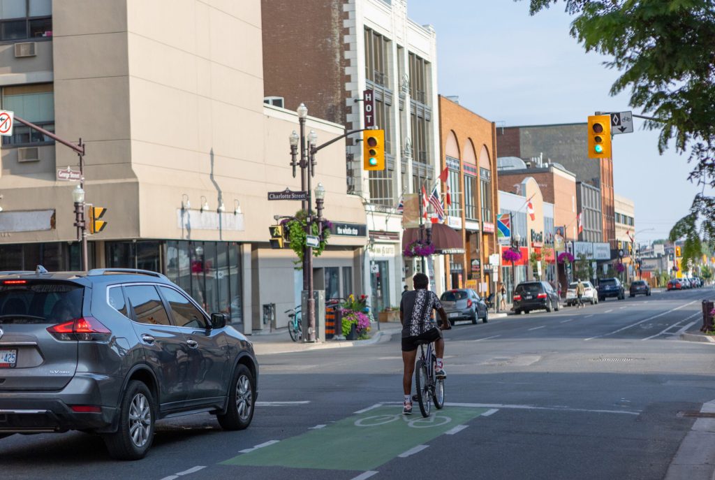 Cyclist riding the dedicated bike lane on George Street